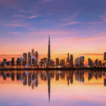 Dubai skyline at sunset, including Burj Khalifa
