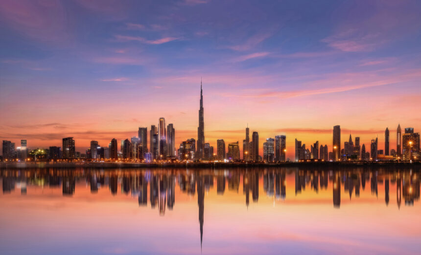 Dubai skyline at sunset, including Burj Khalifa