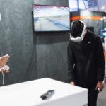Πραγματική φωτογραφία επισκεπτών σε έκθεση τεχνολογίας τον Μάιο 2026